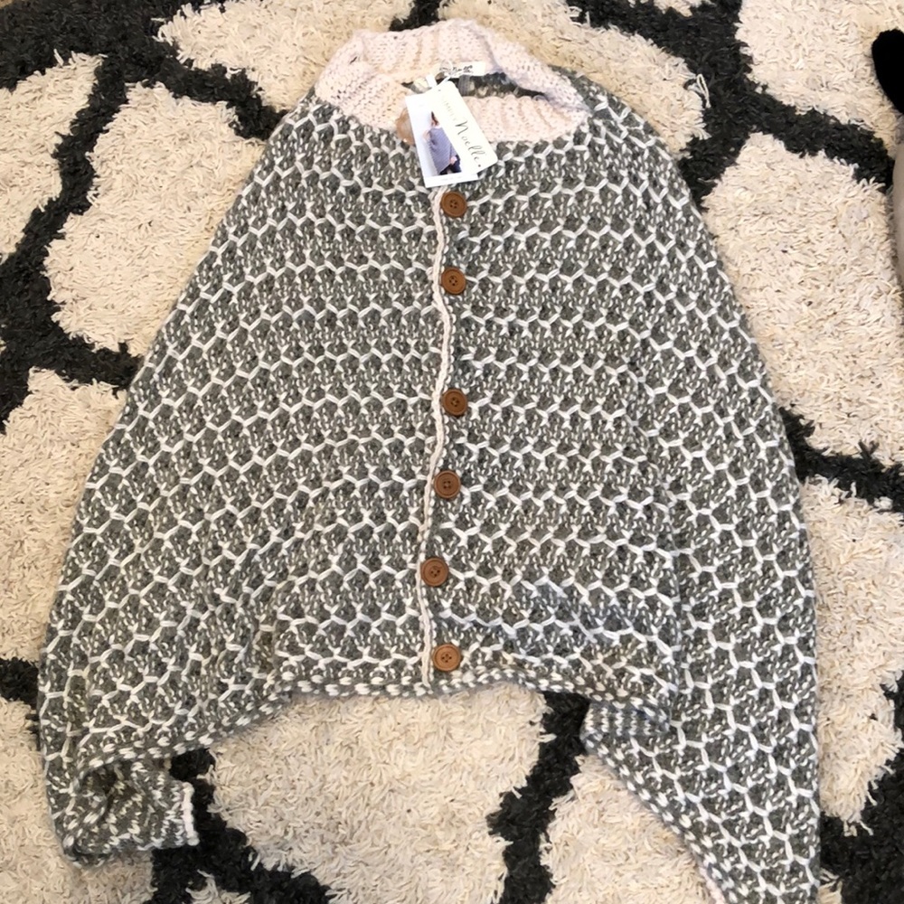Poncho. Cream with grey.